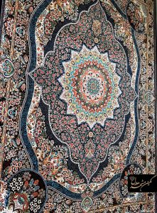 فرش 700 شانه طرح رضوان زمینه سرمه ای کاشان